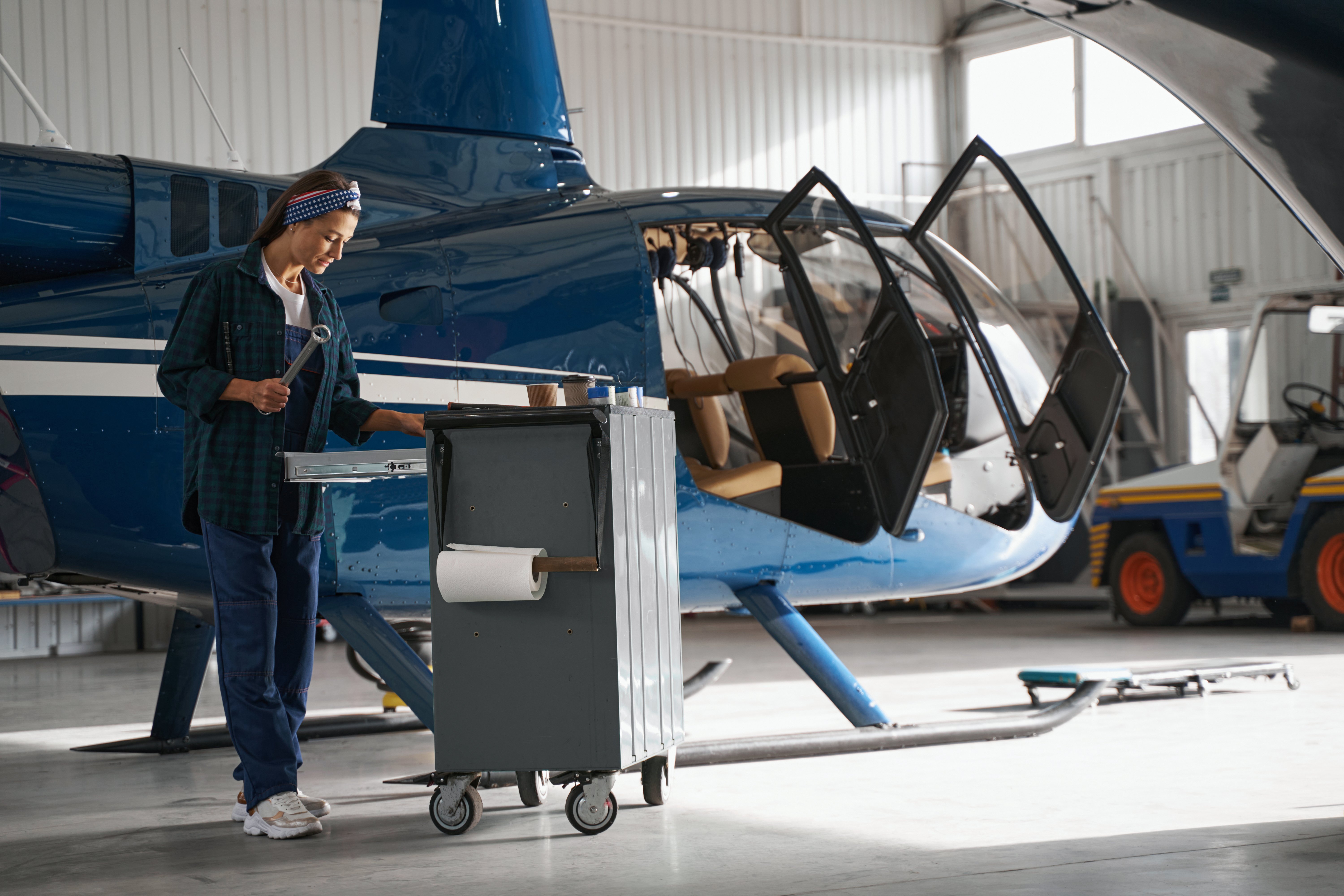 attractive-caucasian-woman-mechanic-in-uniform-wor-2022-02-02-22-57-53-utc